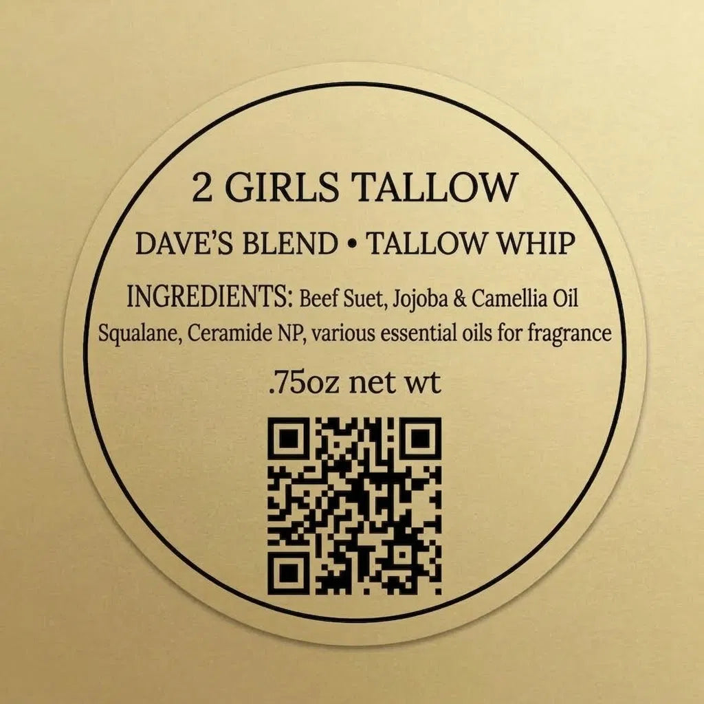 Round gold label reading "2 Girls Tallow, Dave's Blend, Tallow Whip." Ingredients: beef suet, jojoba and camellia oil, squalane, ceramide NP, various essential oils for fragrance. .75oz net wt. A QR code sits at the bottom